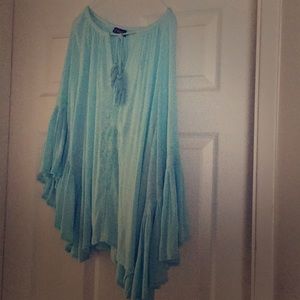 A light blue flowy shirt size large